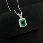 Halo setting emerald cut lab grown emerald pendant necklace 01