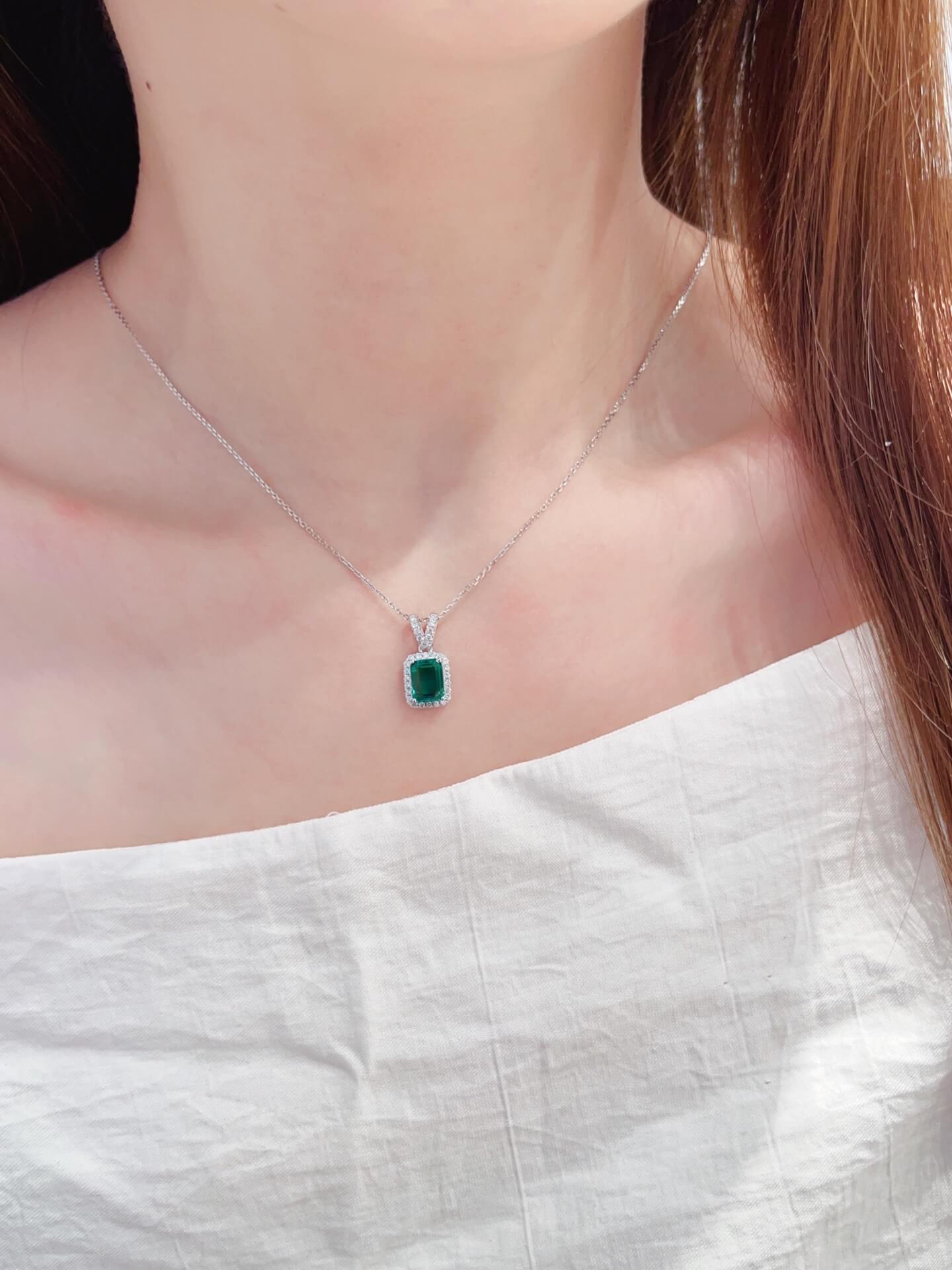 Halo setting emerald cut lab grown emerald pendant necklace 01