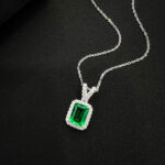 Halo setting emerald cut lab grown emerald pendant necklace 01