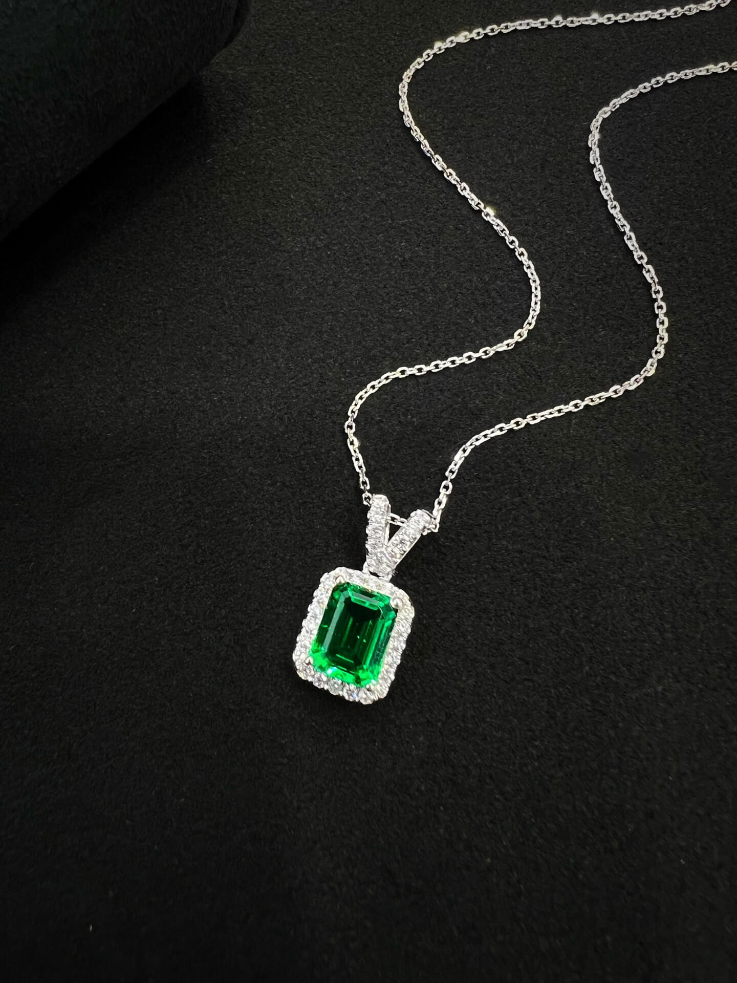 Halo setting emerald cut lab grown emerald pendant necklace 01
