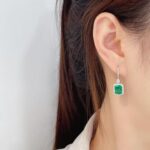 Halo setting lab grown emerald hoop earrings