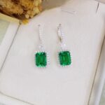 Halo setting lab grown emerald hoop earrings