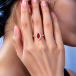 Halo setting marquise cut lab grown ruby engagement ring