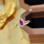 Halo setting marquise cut lab grown ruby engagement ring