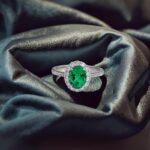Halo setting oval cut lab grown emerald engagement ring 2 Halo setting oval cut lab grown emerald engagement ring