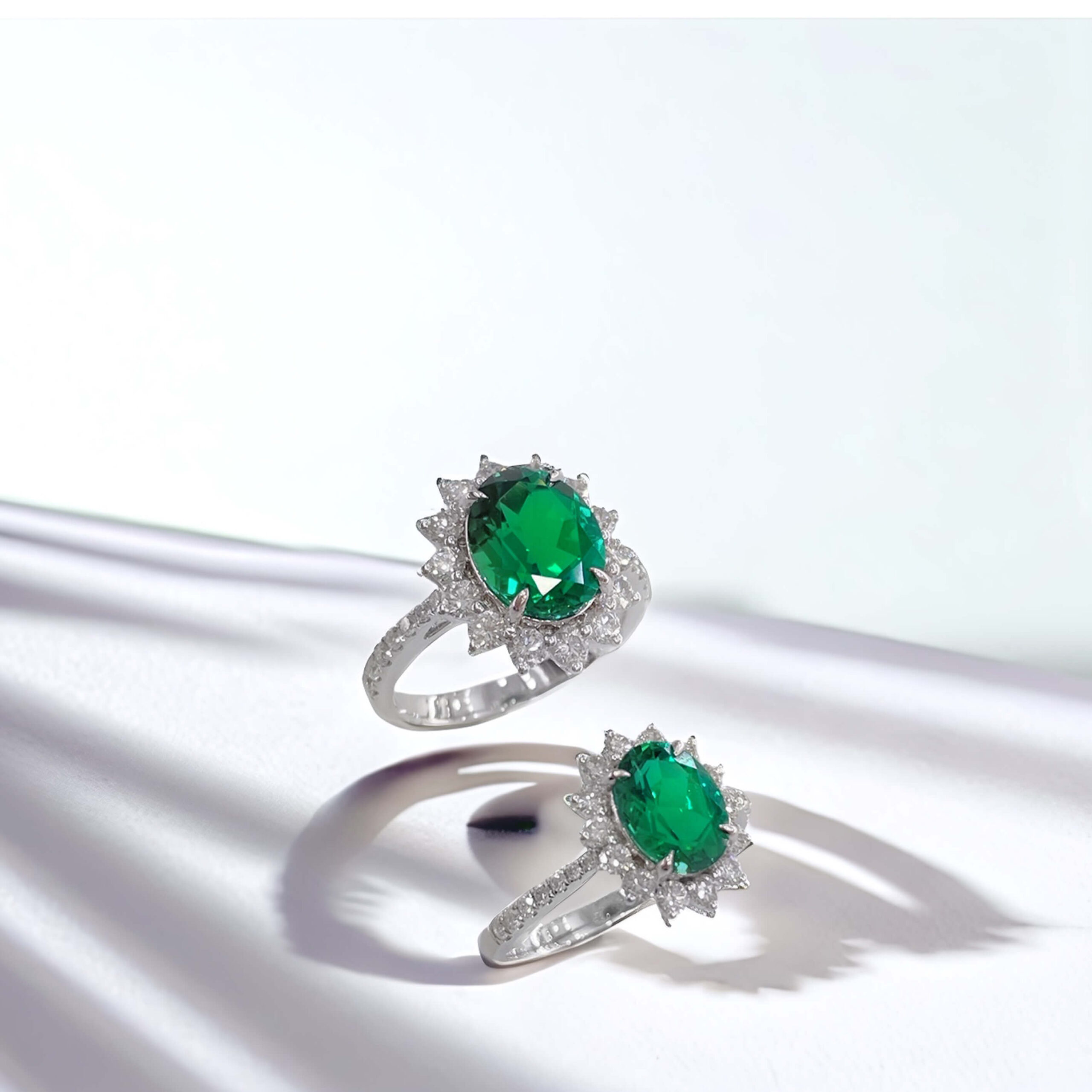 Halo setting oval cut lab grown emerald engagement ring 02 Halo setting oval cut lab grown emerald engagement ring 02