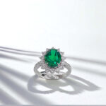 Halo setting oval cut lab grown emerald engagement ring 3 Halo setting oval cut lab grown emerald engagement ring 02
