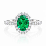 Halo setting oval cut lab grown emerald engagement ring 1 Halo setting oval cut lab grown emerald engagement ring