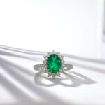 Halo setting oval cut lab grown emerald engagement ring 2 Halo setting oval cut lab grown emerald engagement ring 02