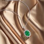 Halo setting oval cut lab grown emerald pendant necklace 02