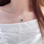 Halo setting oval cut lab grown emerald pendant necklace 01