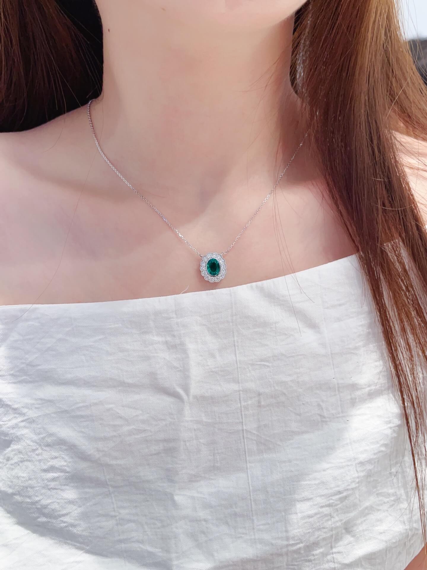 Halo setting oval cut lab grown emerald pendant necklace 01