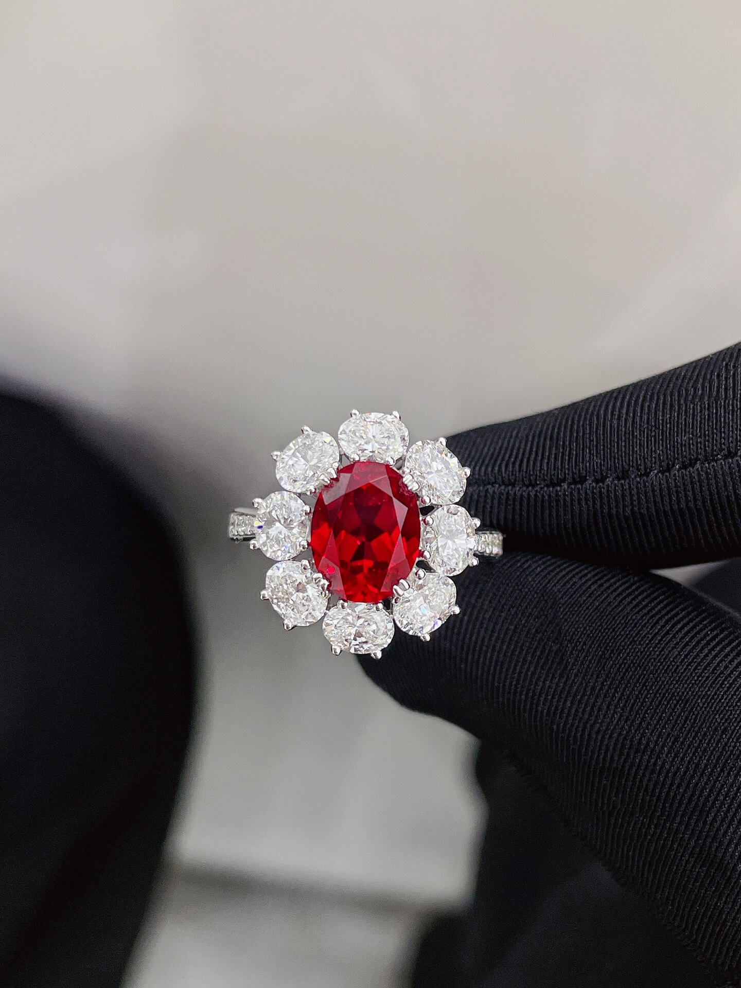 Halo setting oval cut lab grown ruby engagement ring Halo setting oval cut lab grown ruby engagement ring