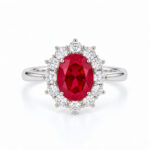 Halo setting oval cut lab grown ruby engagement ring