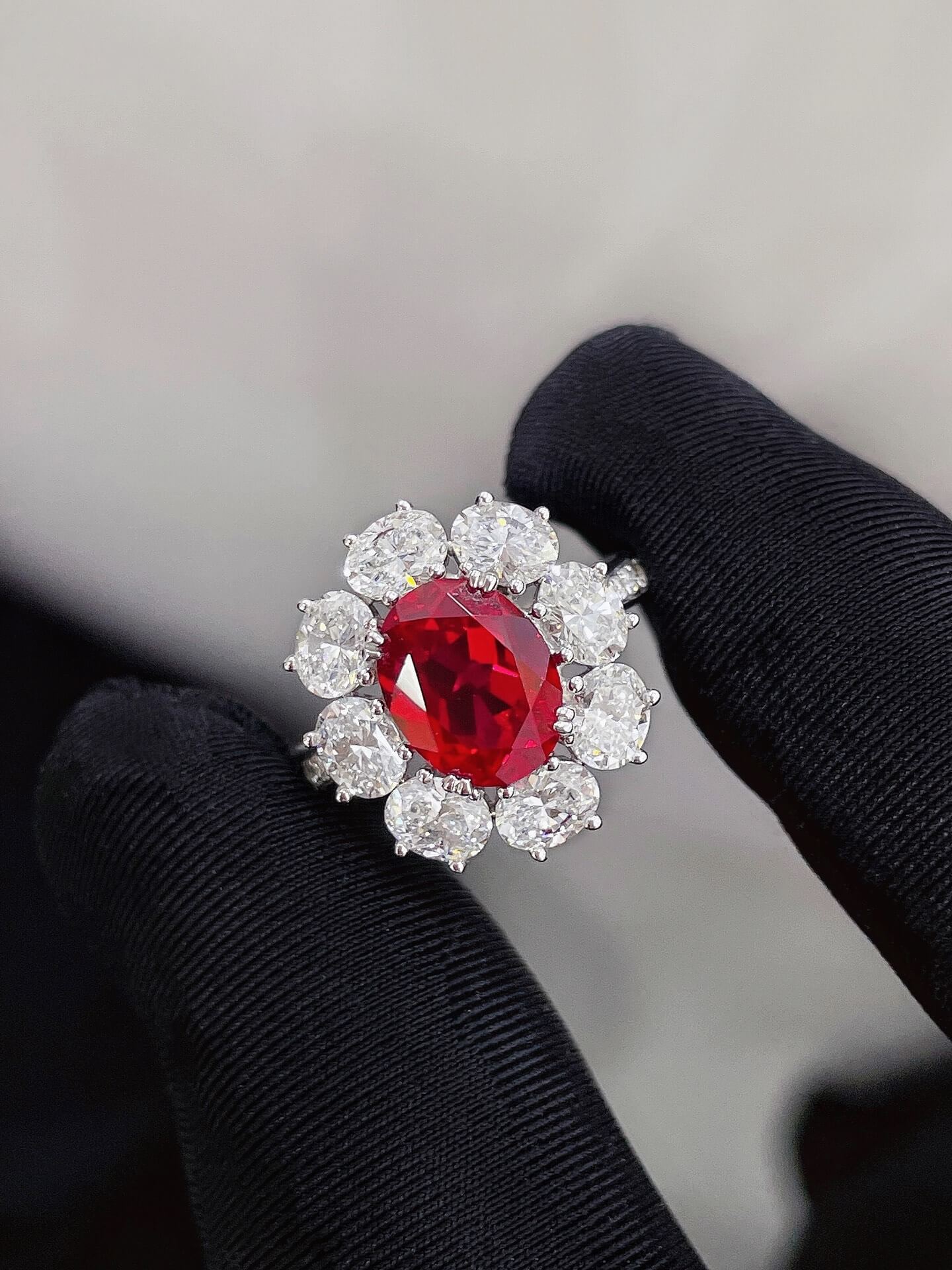 Halo setting oval cut lab grown ruby engagement ring Halo setting oval cut lab grown ruby engagement ring