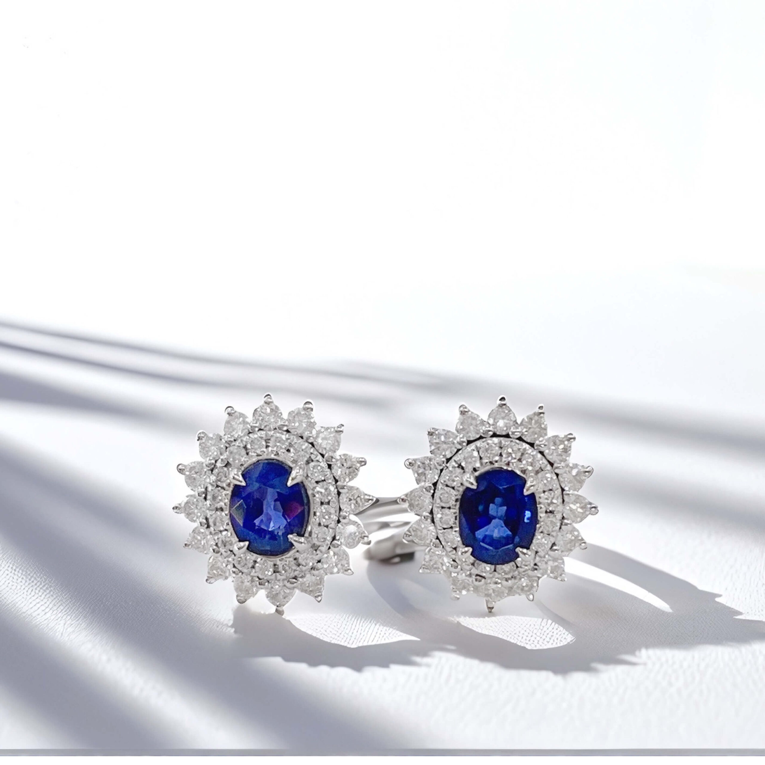 Halo setting oval cut lab grown sapphire earrings stud 03 Halo setting oval cut lab grown sapphire earrings stud 03