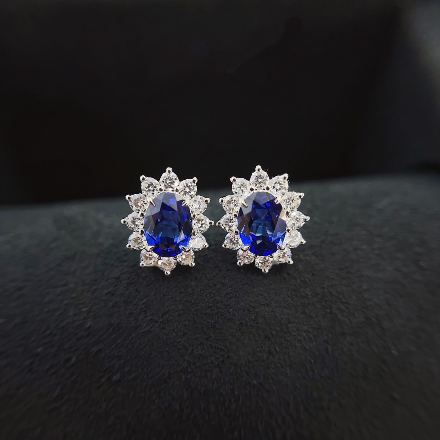 Halo setting oval cut lab grown sapphire earrings stud 01 Halo setting oval cut lab grown sapphire earrings stud 01