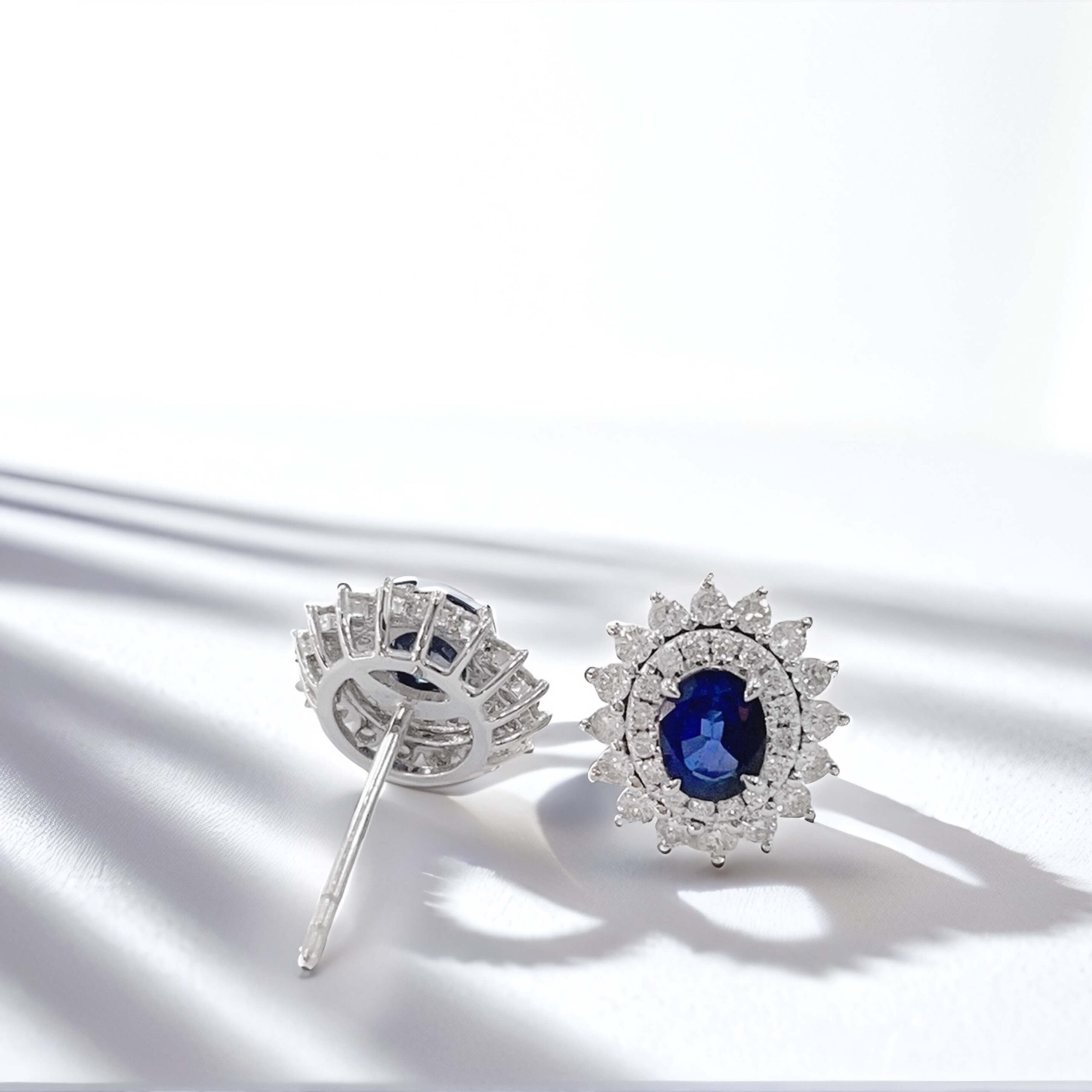 Halo setting oval cut lab grown sapphire earrings stud 03 Halo setting oval cut lab grown sapphire earrings stud 03