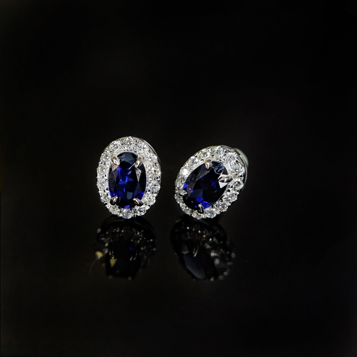 Halo setting oval cut lab grown sapphire earrings stud 04