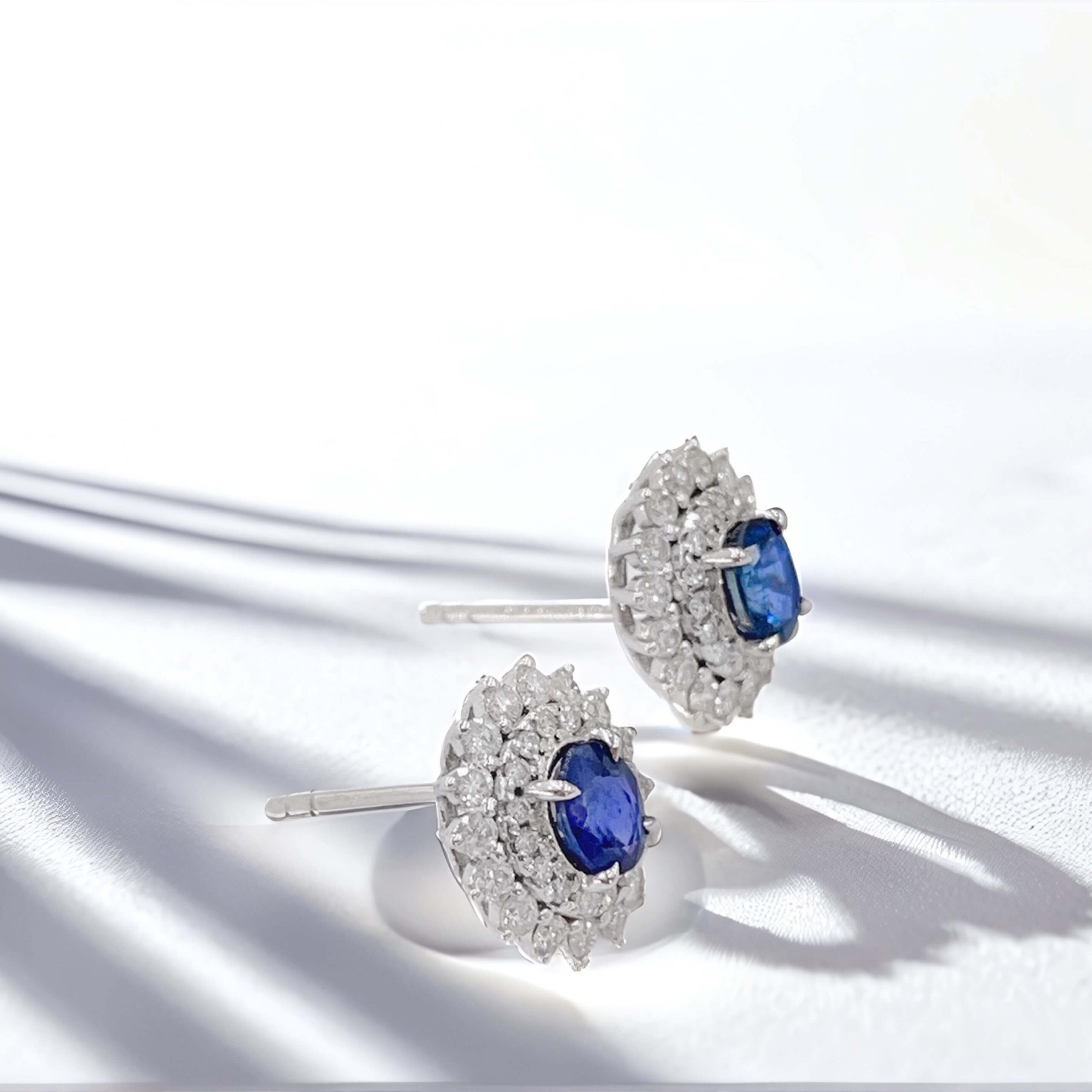 Halo setting oval cut lab grown sapphire earrings stud 03 Halo setting oval cut lab grown sapphire earrings stud 03
