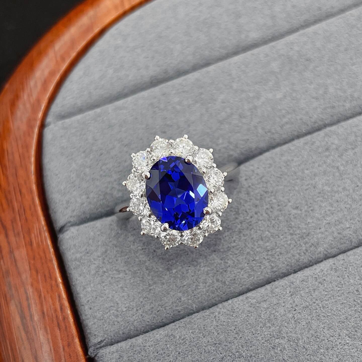 Halo setting oval cut lab grown sapphire engagement ring 05