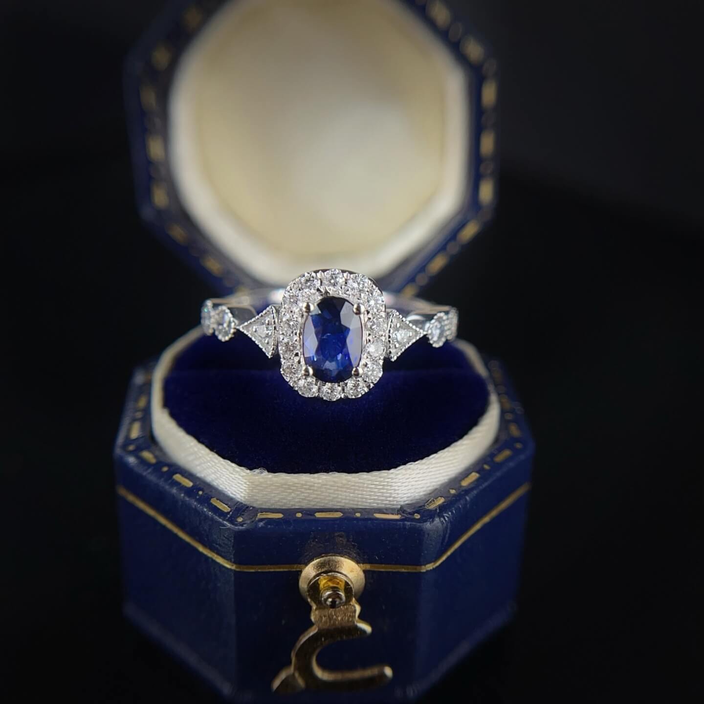 Halo setting oval cut lab grown sapphire engagement ring 06