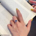 Halo setting oval cut lab grown sapphire engagement ring 04