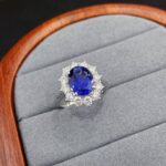 Halo setting oval cut lab grown sapphire engagement ring 05