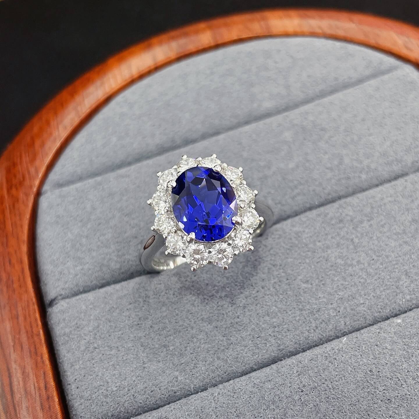 Halo setting oval cut lab grown sapphire engagement ring 05