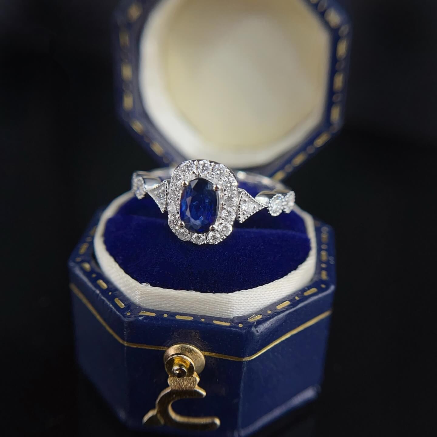 Halo setting oval cut lab grown sapphire engagement ring 06