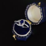 Halo setting oval cut lab grown sapphire engagement ring 01