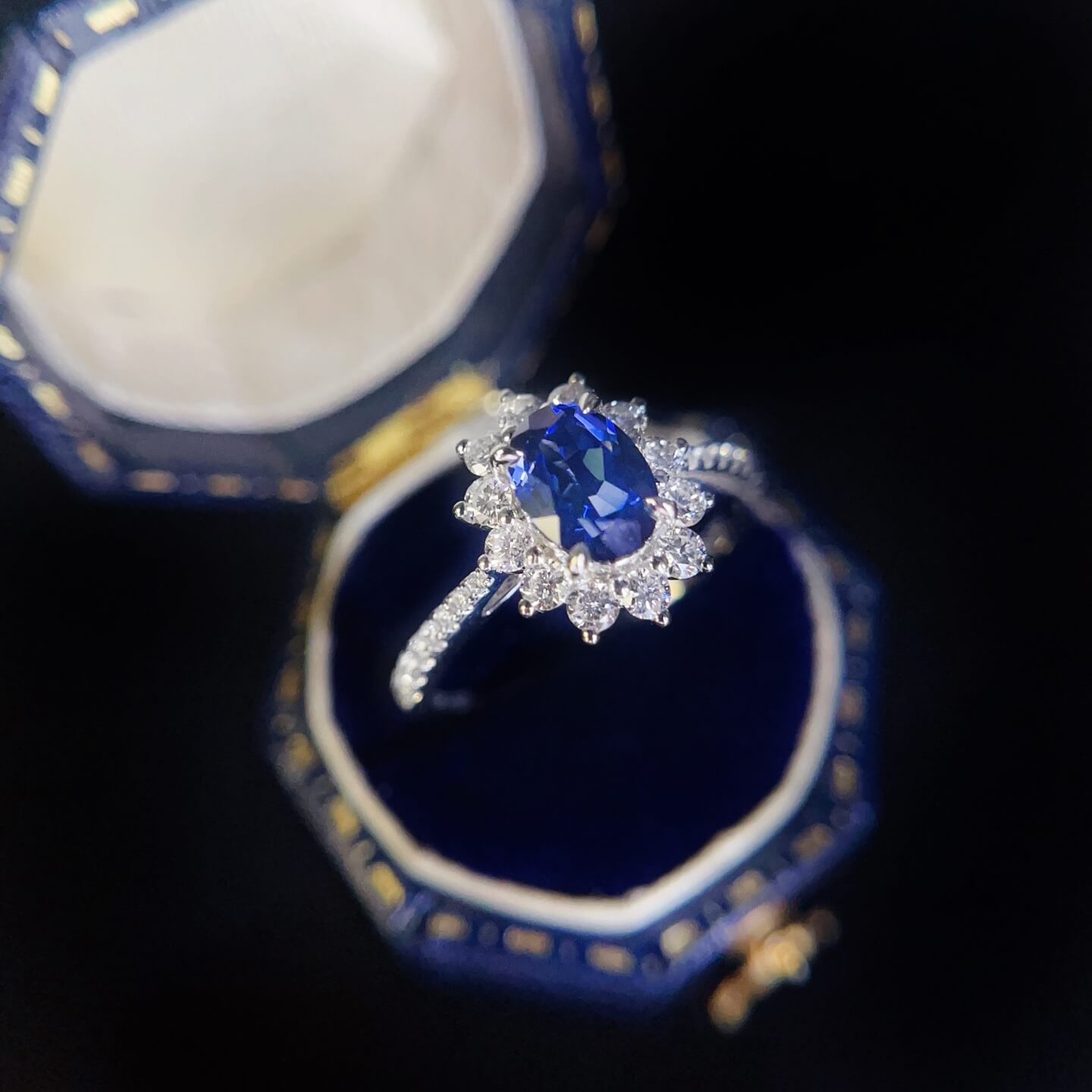 Halo setting oval cut lab grown sapphire engagement ring 04