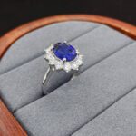 Halo setting oval cut lab grown sapphire engagement ring 05