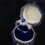 Halo setting oval cut lab grown sapphire engagement ring 06