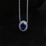 Halo setting oval cut lab grown sapphire pendant necklace 01