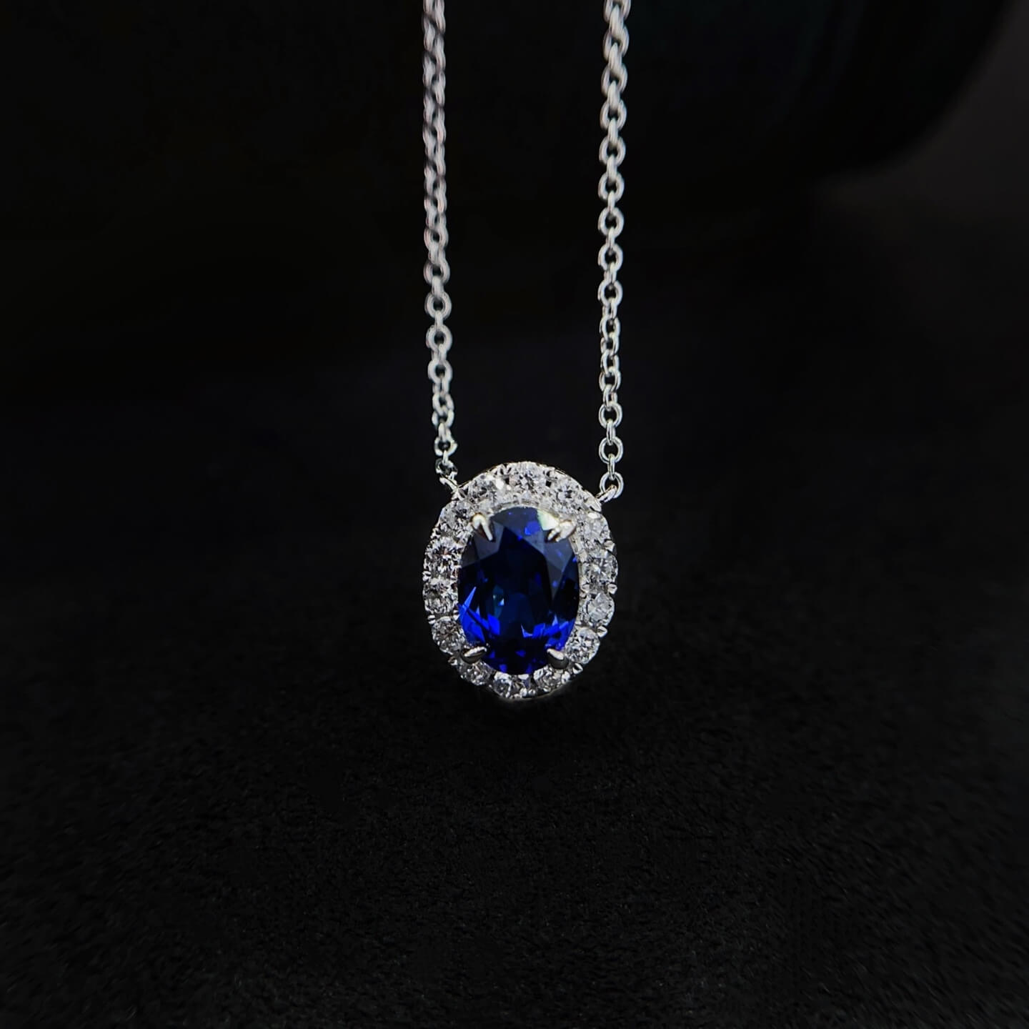 Halo setting oval cut lab grown sapphire pendant necklace 01