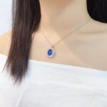 Halo setting oval cut lab grown sapphire pendant necklace 5 Halo setting oval cut lab grown sapphire pendant necklace 02