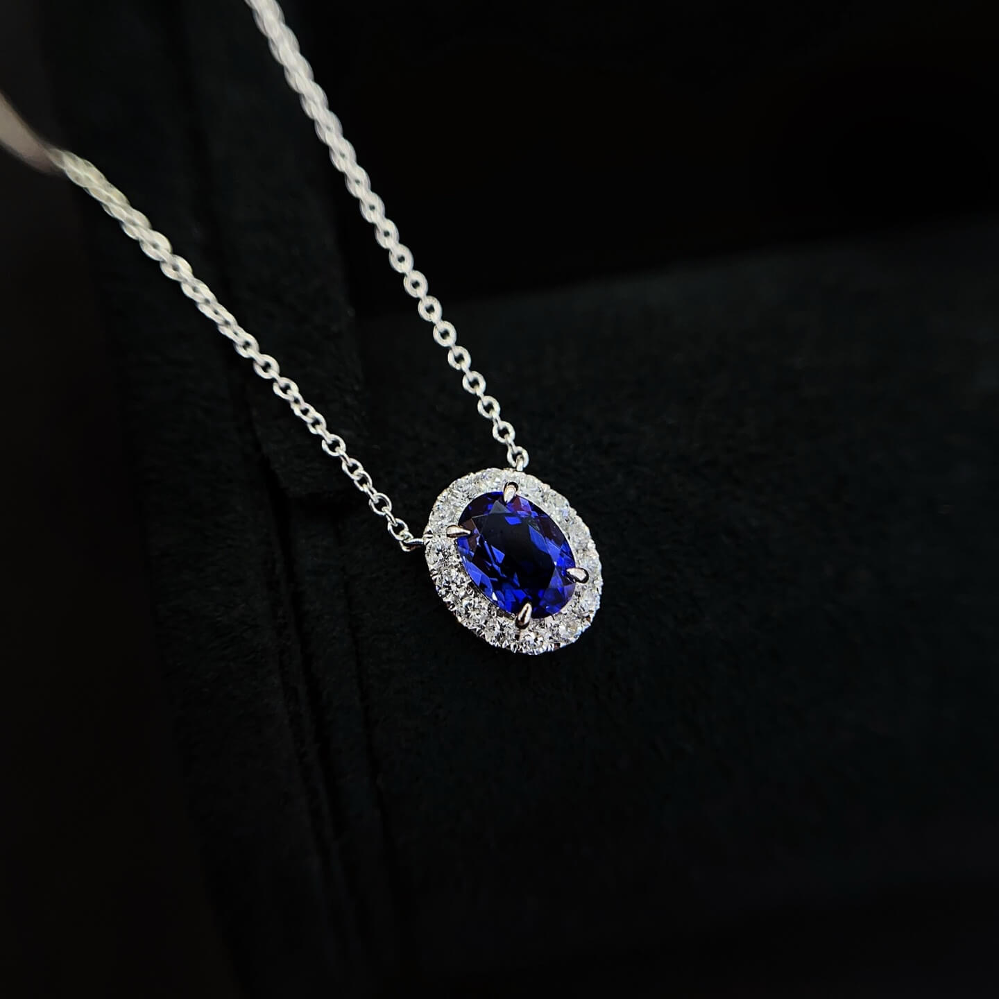Halo setting oval cut lab grown sapphire pendant necklace 01