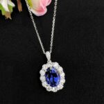 Halo setting oval cut lab grown sapphire pendant necklace 2 Halo setting oval cut lab grown sapphire pendant necklace 02