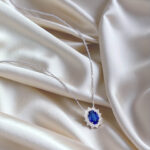 Halo setting oval cut lab grown sapphire pendant necklace 4 Halo setting oval cut lab grown sapphire pendant necklace 04