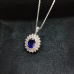 Halo setting oval cut lab grown sapphire pendant necklace 3 Halo setting oval cut lab grown sapphire pendant necklace 05