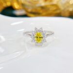 Halo setting oval cut lab grown yellow diamond engagement ring