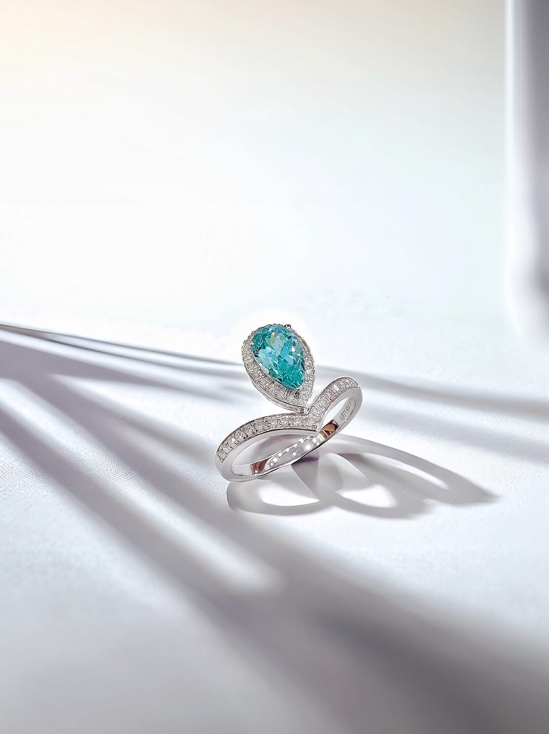 Halo setting pear cut lab grown Paraiba engagement ring 01 Halo setting pear cut lab grown Paraiba engagement ring 01