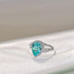 Halo setting pear cut lab grown Paraiba engagement ring 3 Halo setting pear cut lab grown Paraiba engagement ring 02