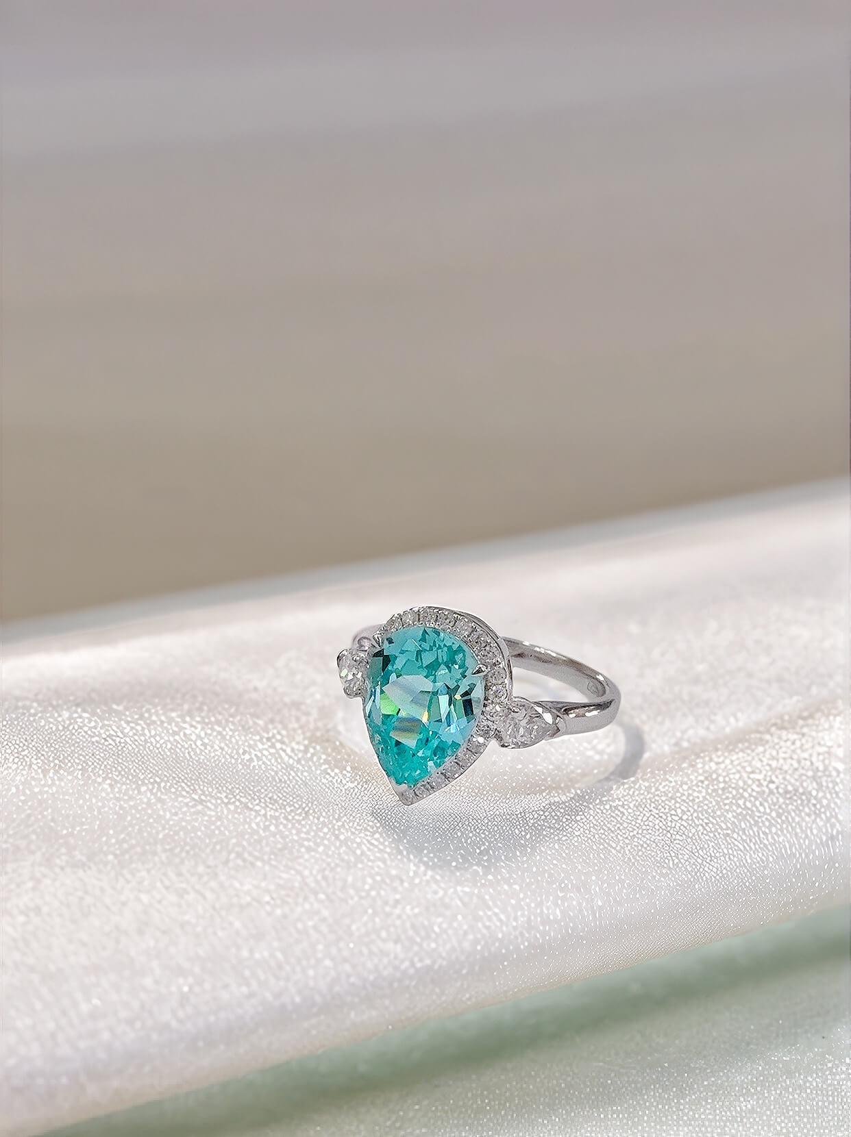 Halo setting pear cut lab grown Paraiba engagement ring 02 Halo setting pear cut lab grown Paraiba engagement ring 02