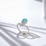 Halo setting pear cut lab grown Paraiba engagement ring 3 Halo setting pear cut lab grown Paraiba engagement ring 01