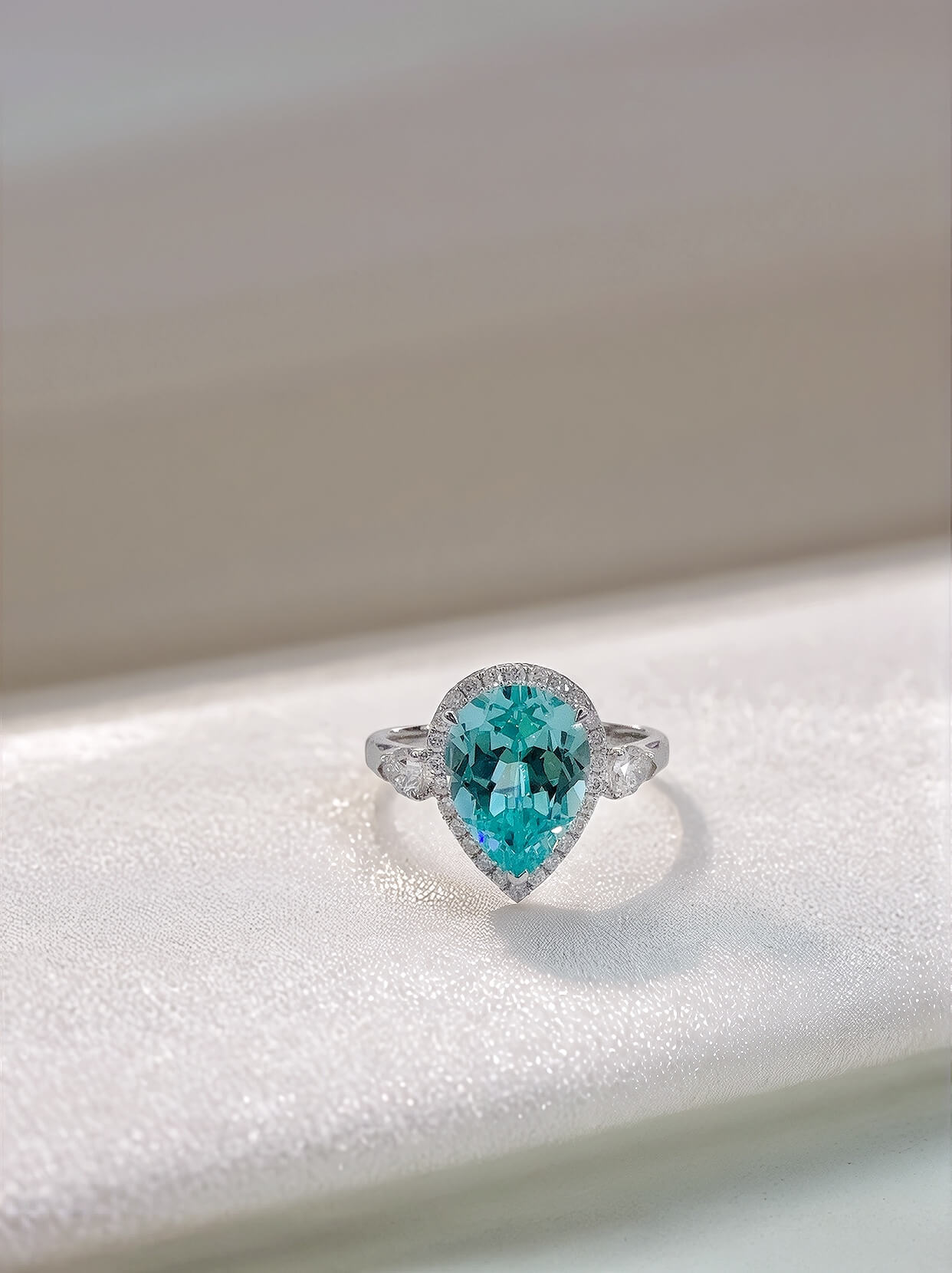 Halo setting pear cut lab grown Paraiba engagement ring 02 Halo setting pear cut lab grown Paraiba engagement ring 02