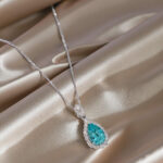 Halo setting pear cut lab grown paraiba pendant necklace 4 Halo setting pear cut lab grown paraiba pendant necklace 01