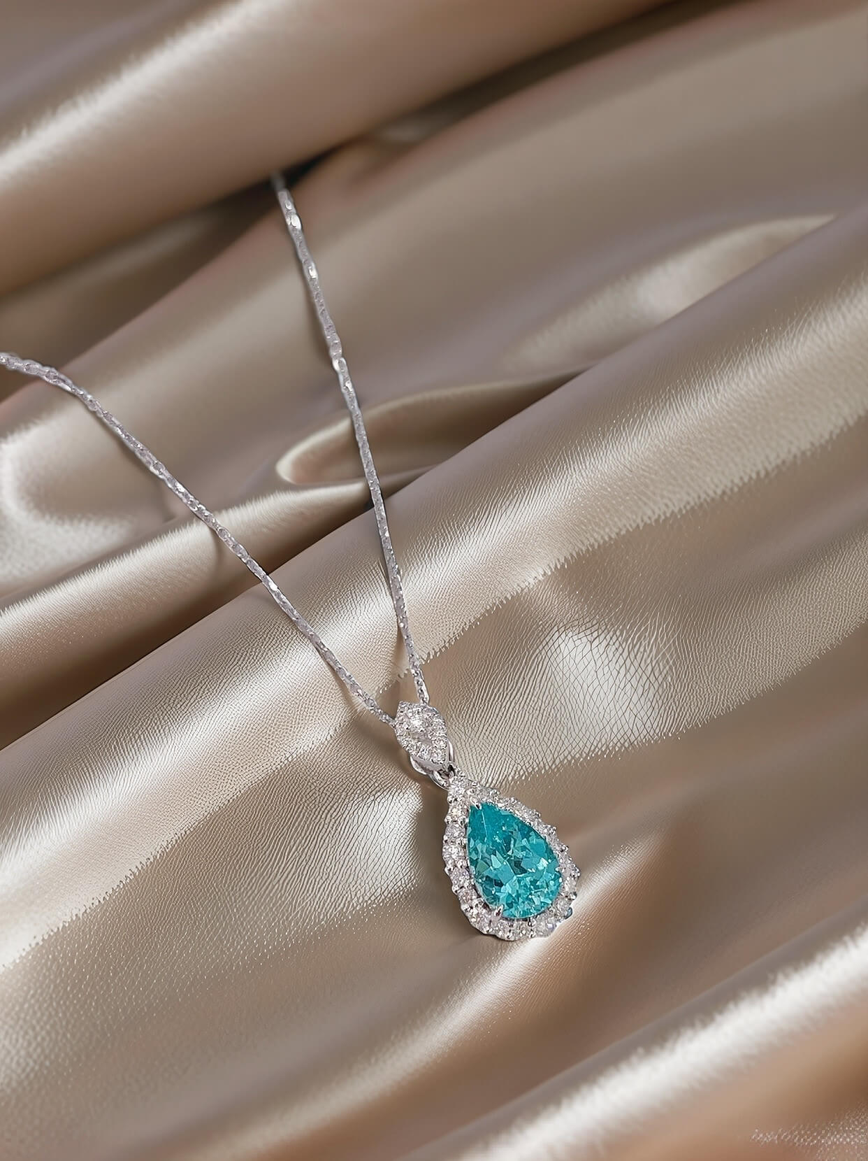 Halo setting pear cut lab grown paraiba pendant necklace 01 Halo setting pear cut lab grown paraiba pendant necklace 01