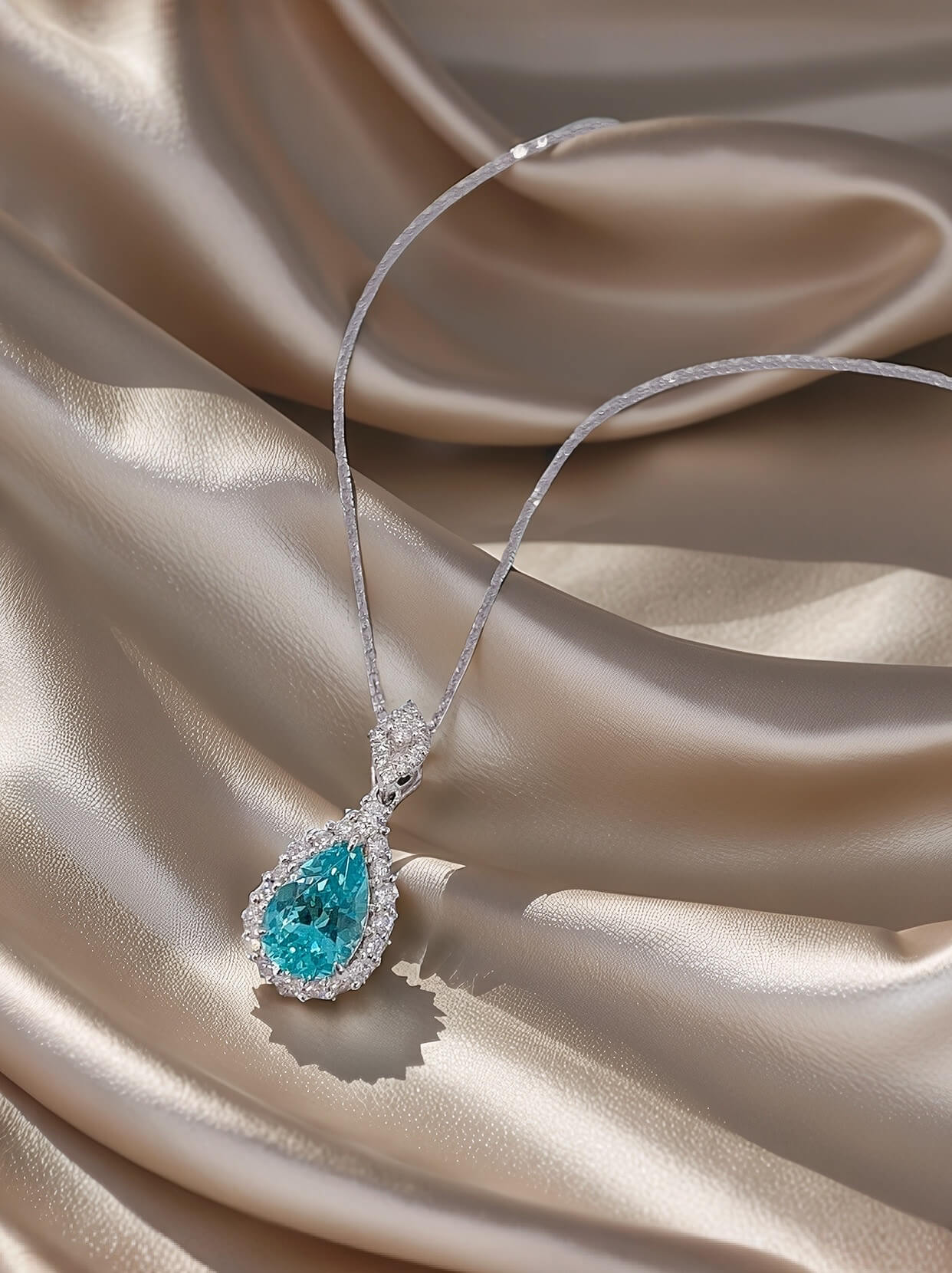 Halo setting pear cut lab grown paraiba pendant necklace 01 Halo setting pear cut lab grown paraiba pendant necklace 01